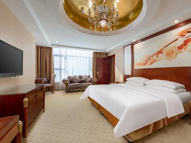 Bed in Vienna Hotel Shenzhen Songgang Shajiang Road