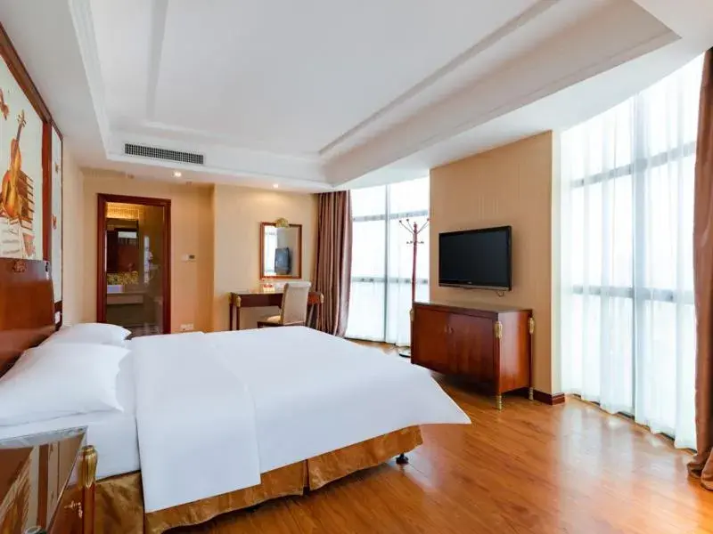 Bed in Vienna Hotel Shenzhen Songgang Shajiang Road Bed in Vienna Hotel Shenzhen Songgang Shajiang Road