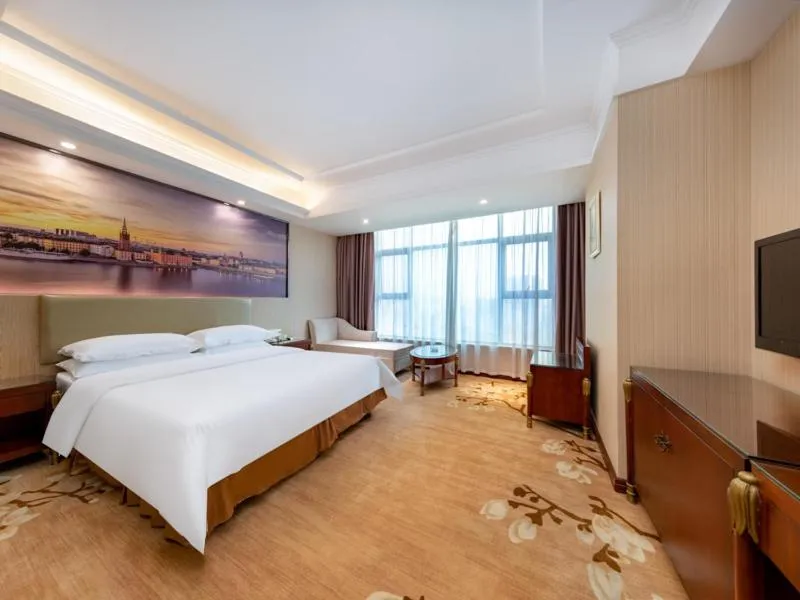 Bed in Vienna Hotel Shenzhen Songgang Shajiang Road