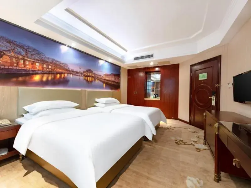 Bed in Vienna Hotel Shenzhen Songgang Shajiang Road Bed in Vienna Hotel Shenzhen Songgang Shajiang Road