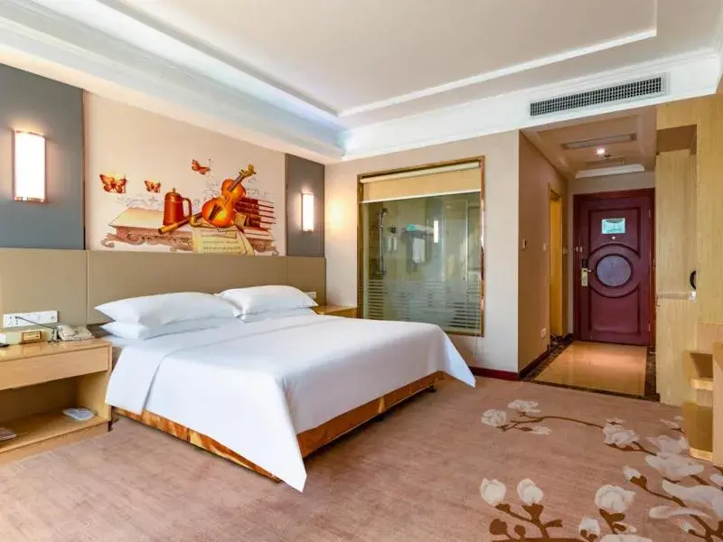Bed in Vienna Hotel Shenzhen Songgang Shajiang Road Bed in Vienna Hotel Shenzhen Songgang Shajiang Road