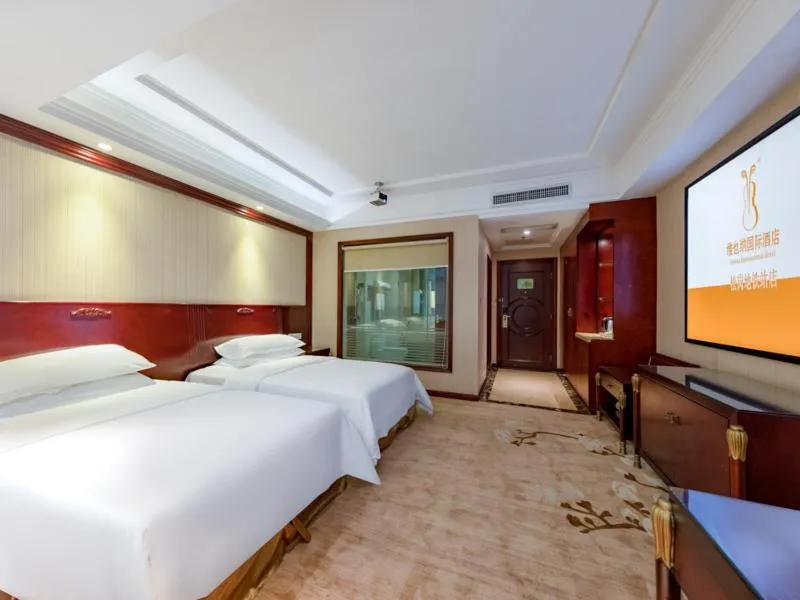 Bed in Vienna Hotel Shenzhen Songgang Shajiang Road