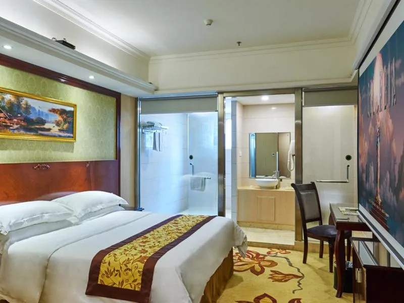 Bed in Vienna Hotel Shenzhen Shajing Shangnan