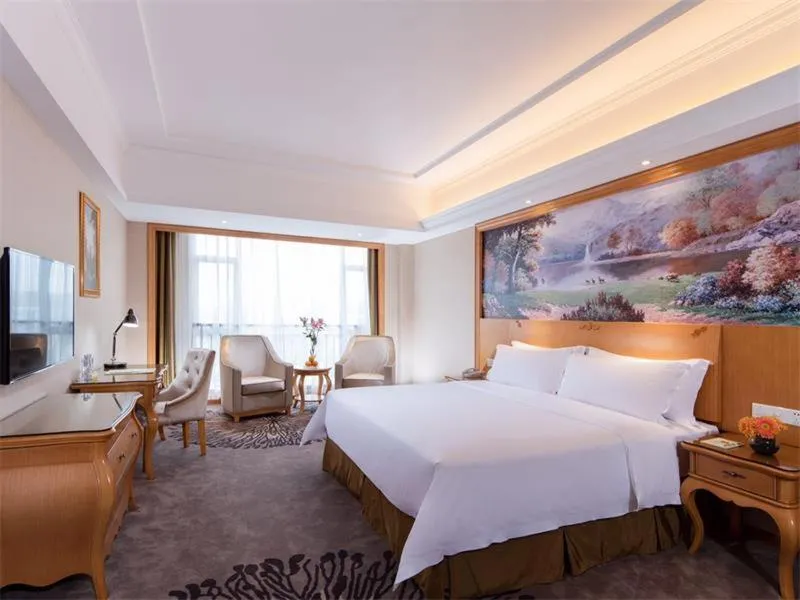 Bed in Vienna Hotel Shenzhen Shajing Shangnan