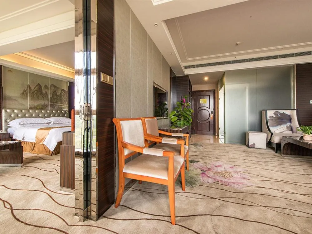 Bed in Vienna International Hotel Shenzhen Longgang Lilang