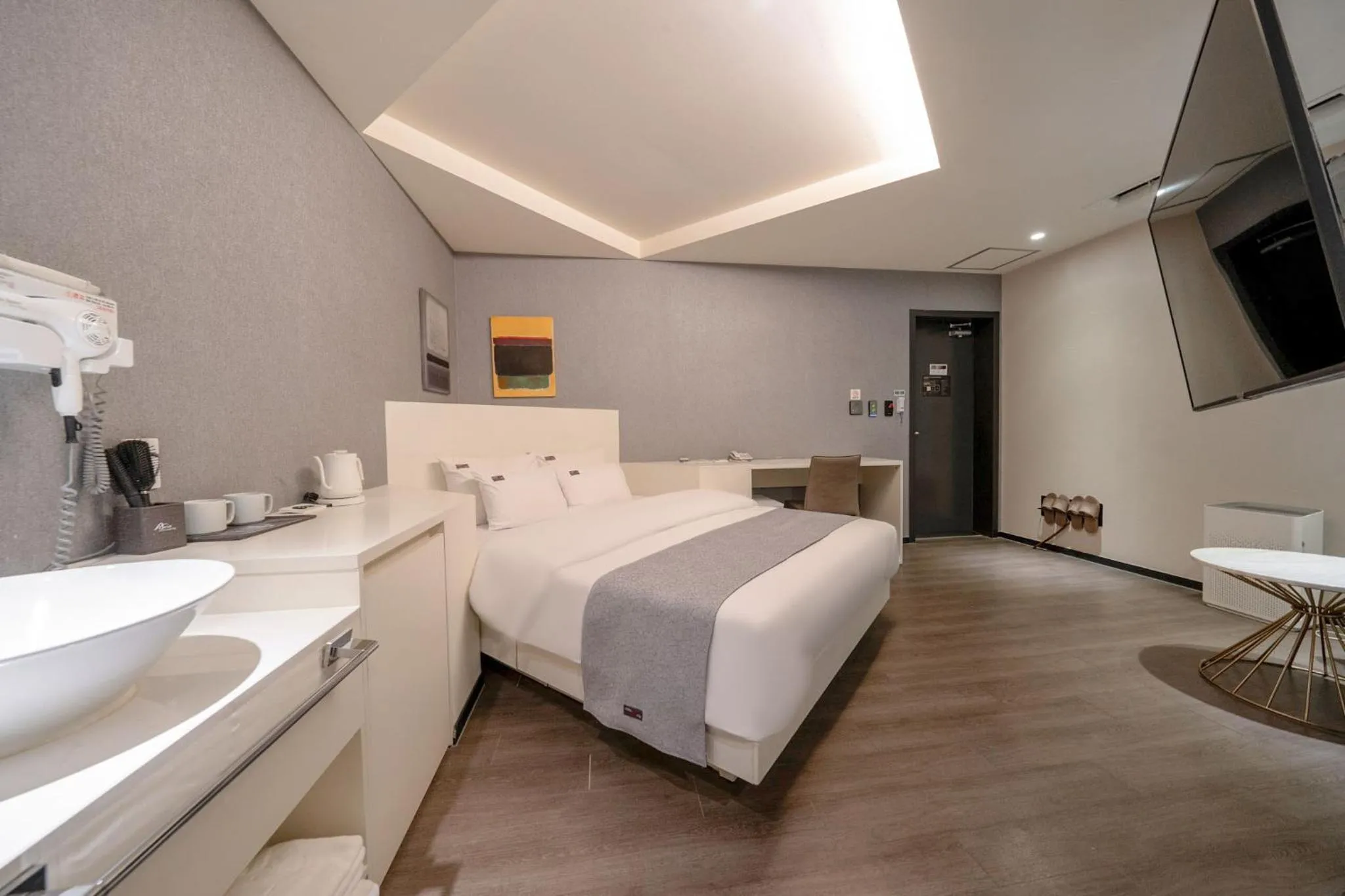 Bed in Cheonho Aria Hotel
