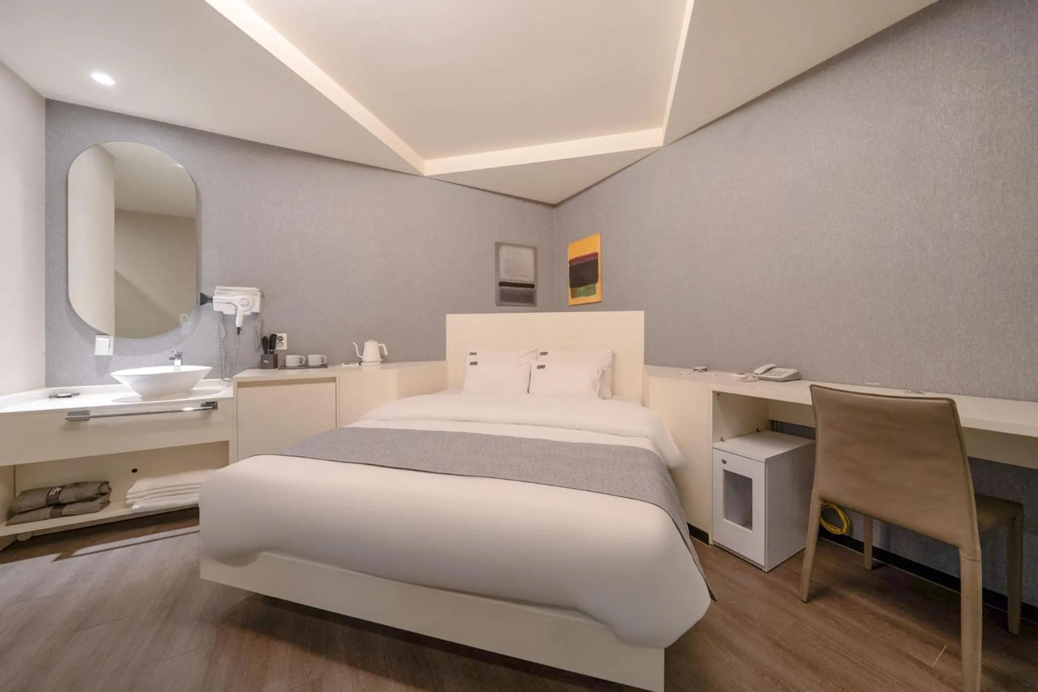 Bed in Cheonho Aria Hotel