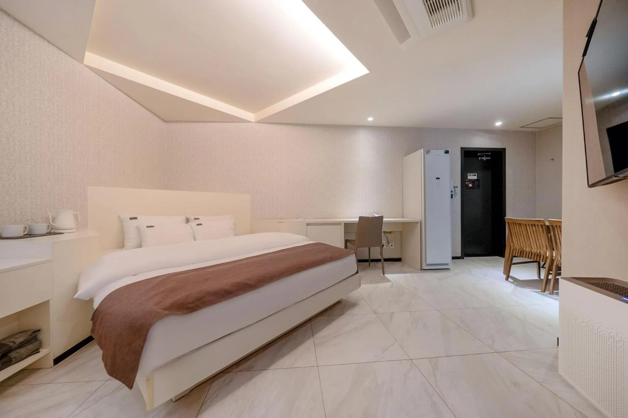 Bed in Cheonho Aria Hotel