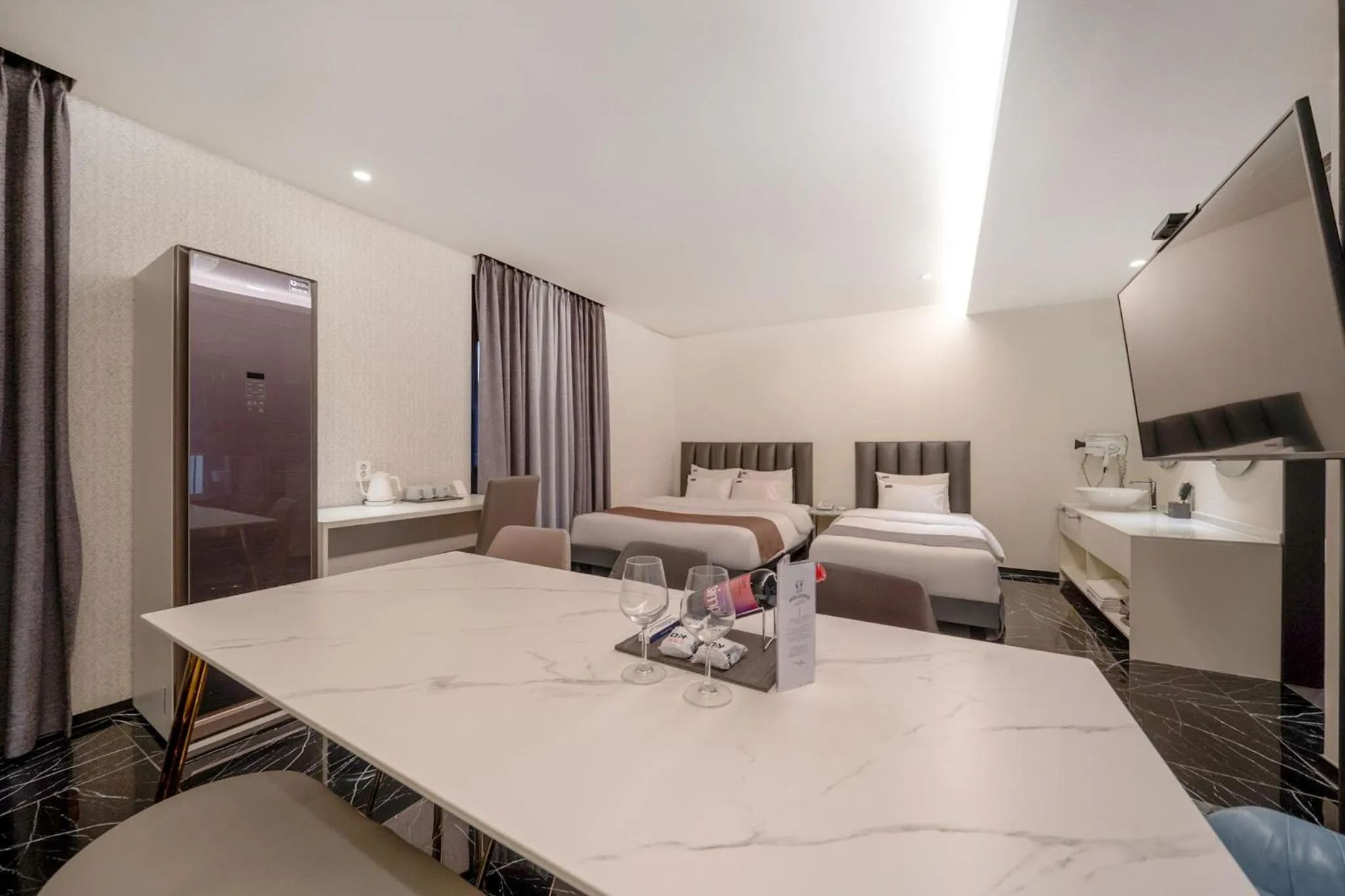 Bed in Cheonho Aria Hotel