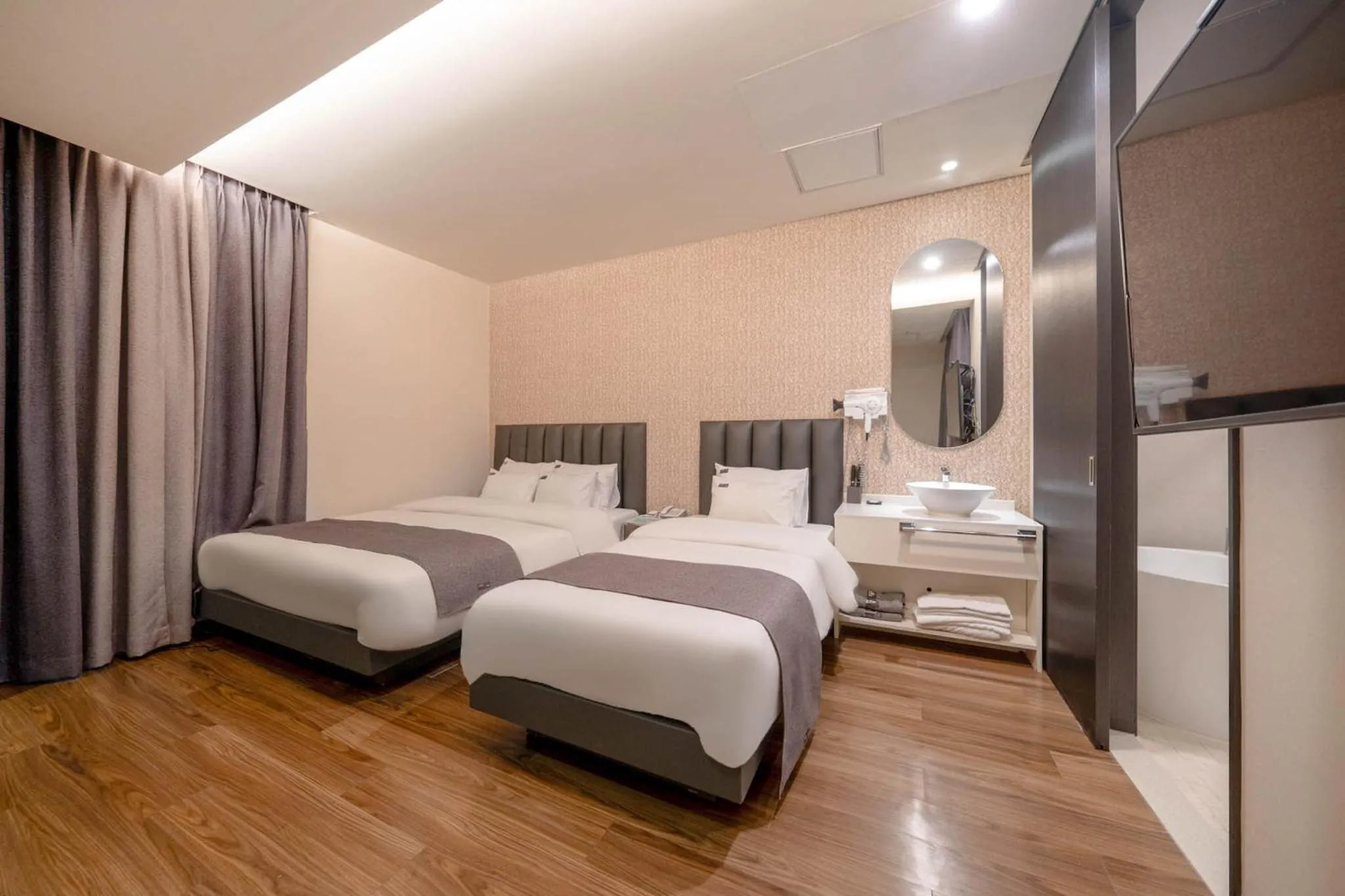 Bed in Cheonho Aria Hotel