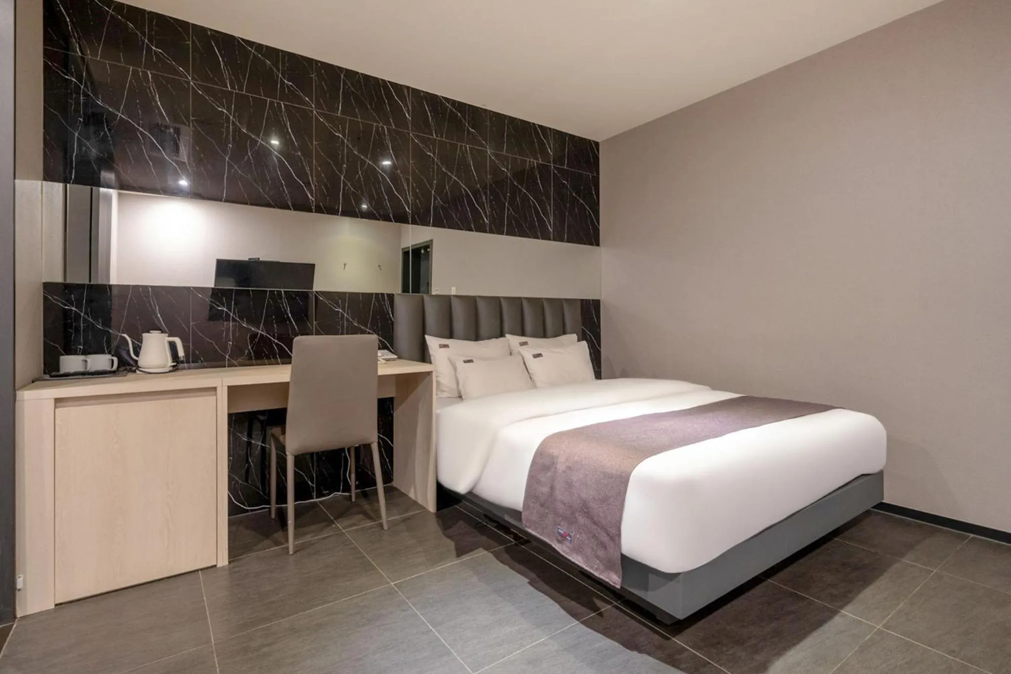 Bed in Cheonho Aria Hotel