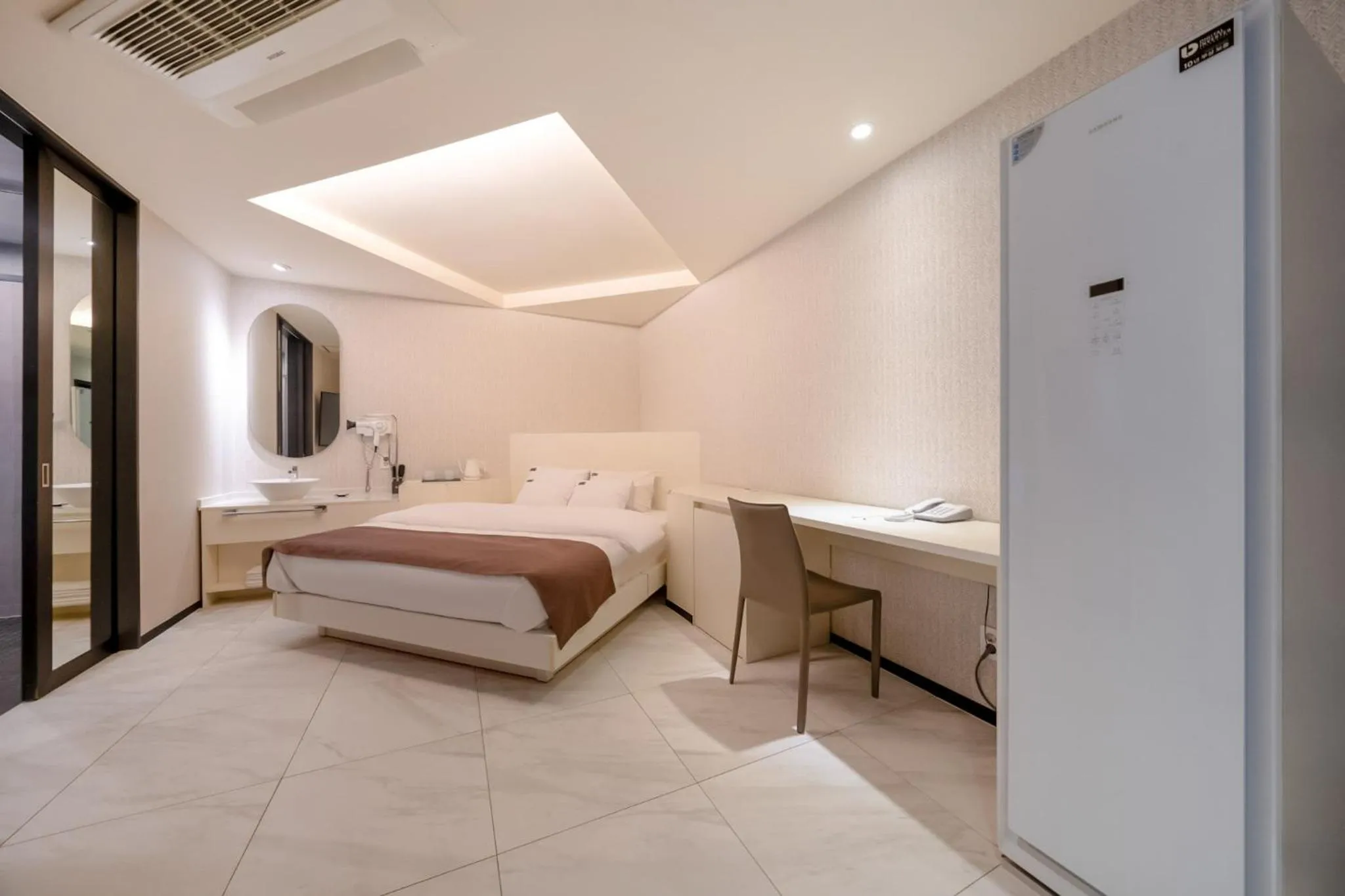 Bed in Cheonho Aria Hotel