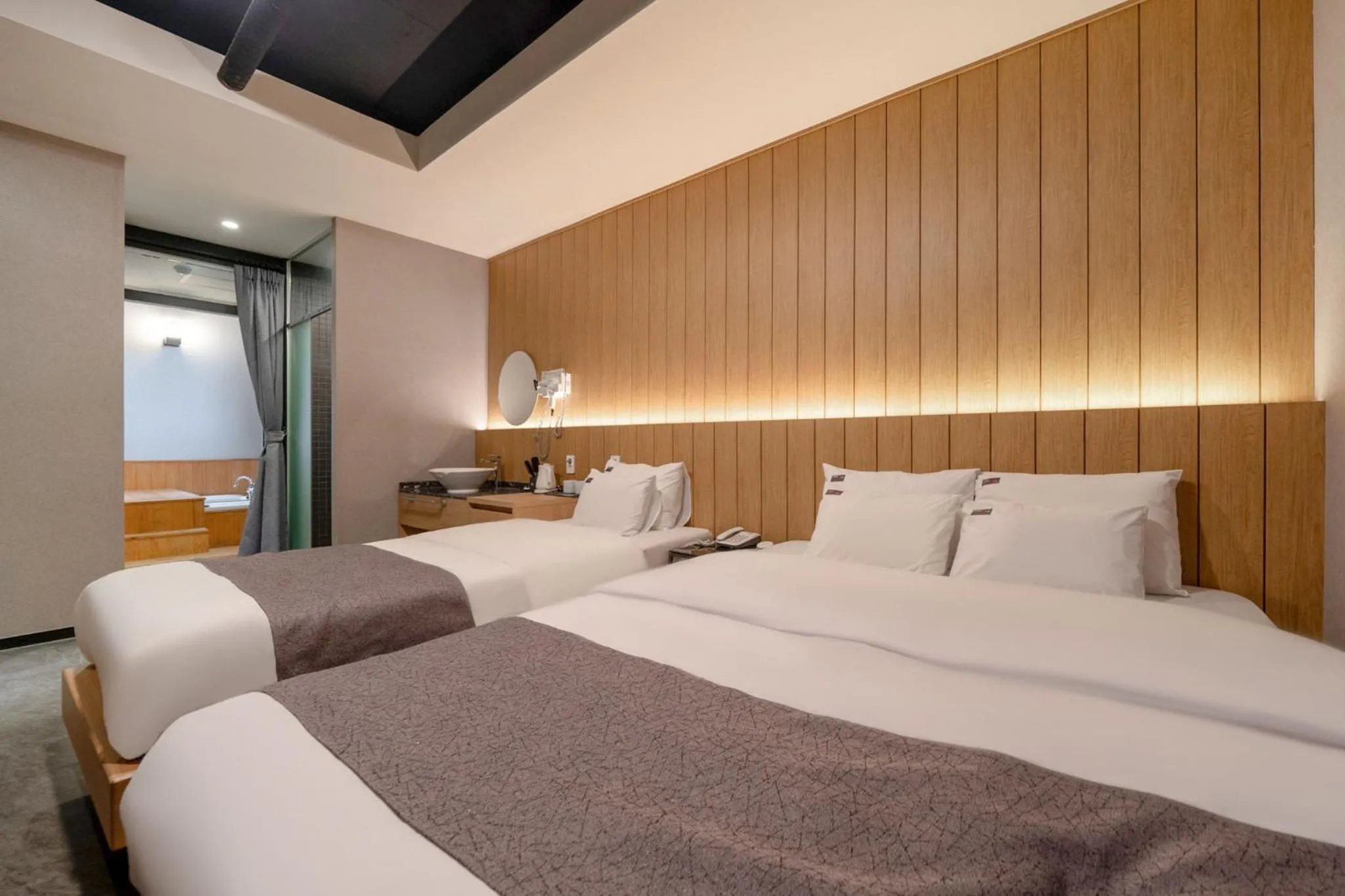 Bed in Cheonho Aria Hotel