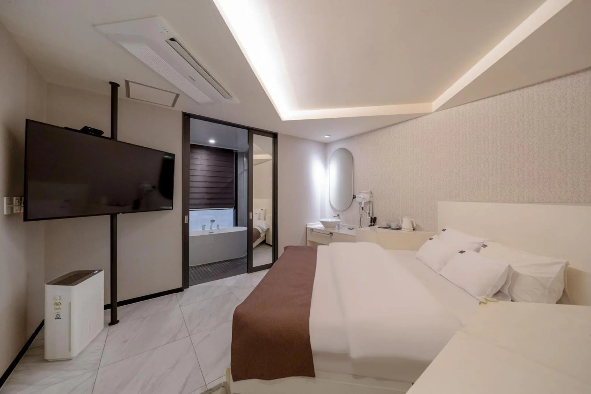 Bed in Cheonho Aria Hotel