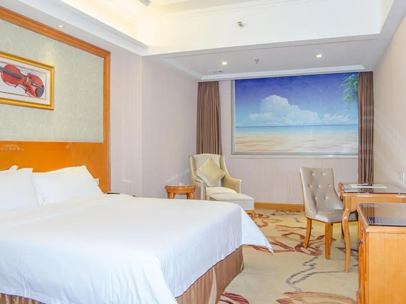 Bed in Vienna Hotel Dongguan Mayong Centre Avenue