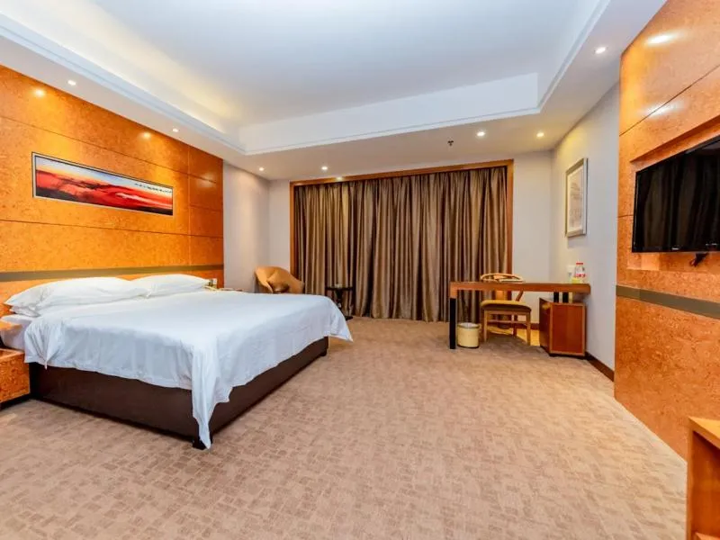 Bed in Vienna Hotel Dongguan Tangxia Binfen Plaza