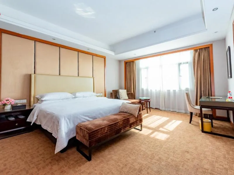 Bed in Vienna Hotel Dongguan Tangxia Binfen Plaza