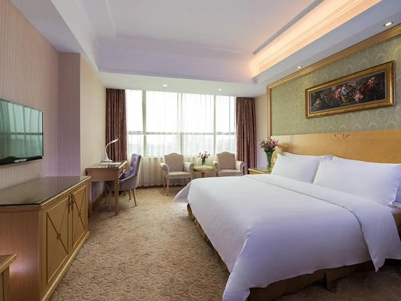 Bed in Vienna Hotel Dongguan Tangxia Lincun Square