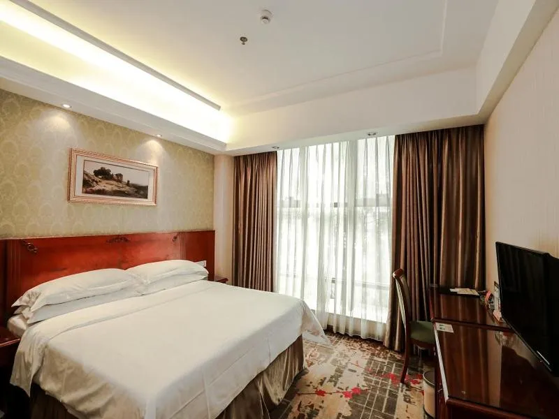 Bed in Vienna Hotel Dongguan Hou street Wanda Plaza