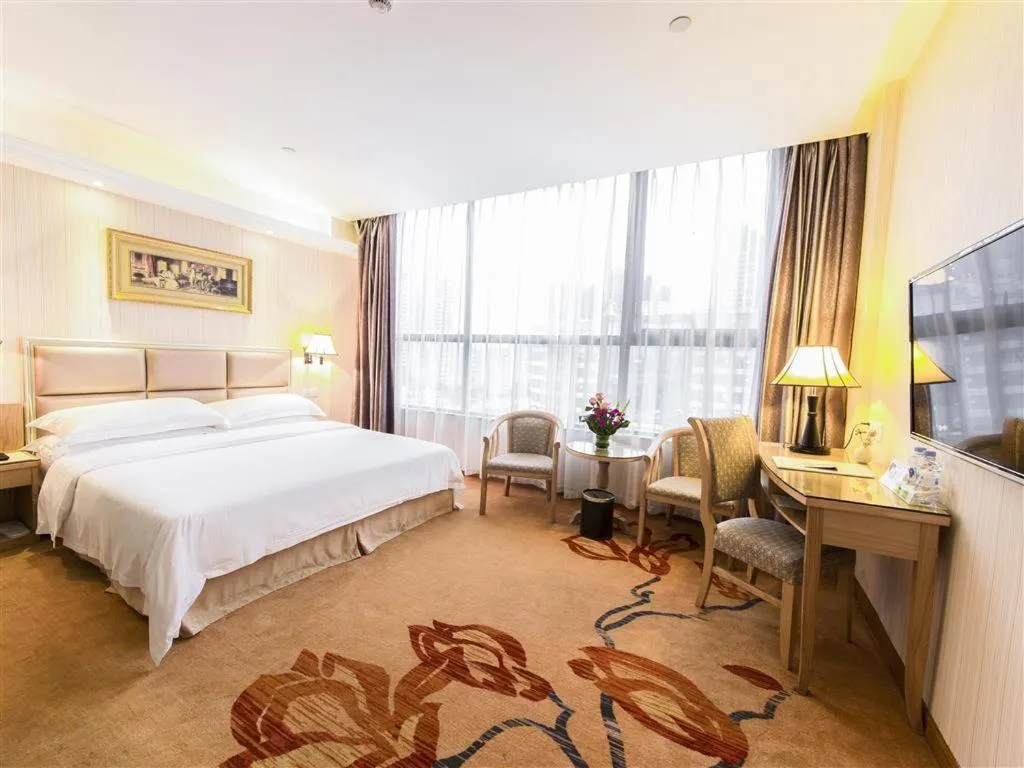 Bed in Vienna Hotel Zhanjiang Coast Avenue
