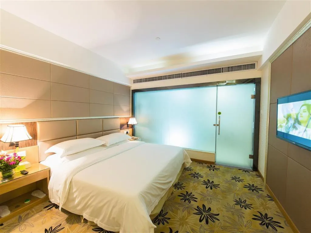 Bed in Vienna Hotel Zhanjiang Coast Avenue