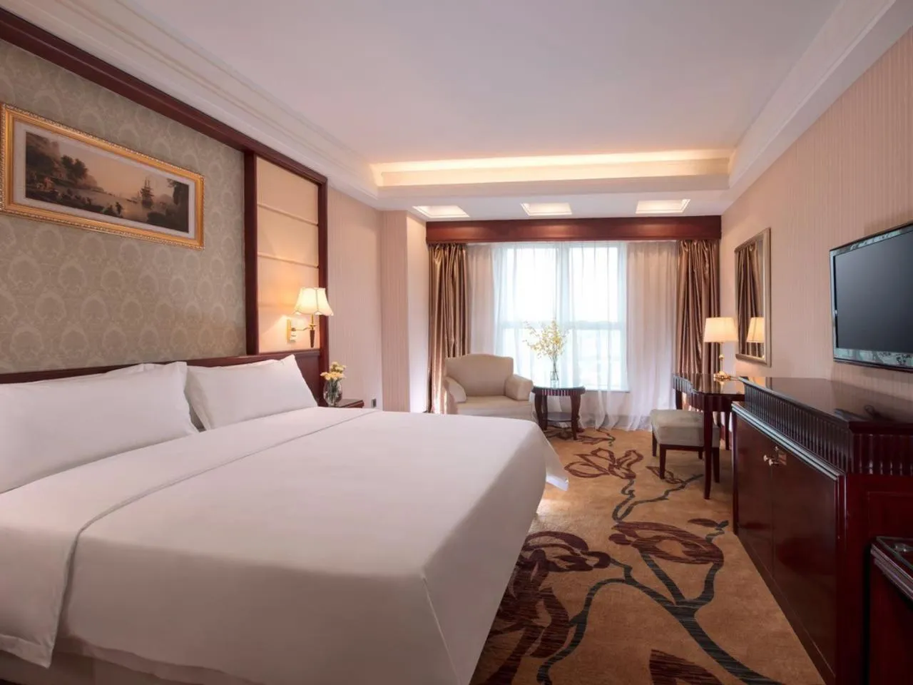 Bed in Vienna Hotel Foshan Nanzhuang Avenue