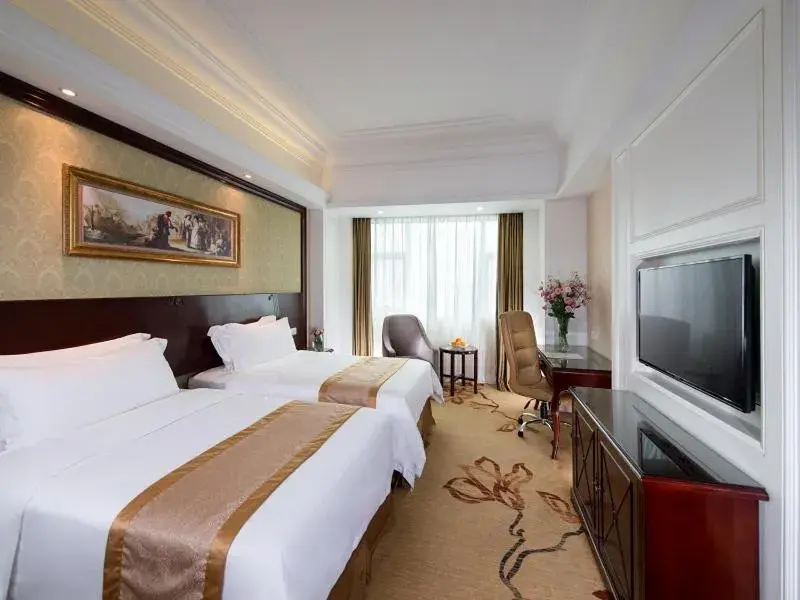 Bed in Vienna International Hotel Zhongshan Shiqi Kanghua Road Bed in Vienna International Hotel Zhongshan Shiqi Kanghua Road