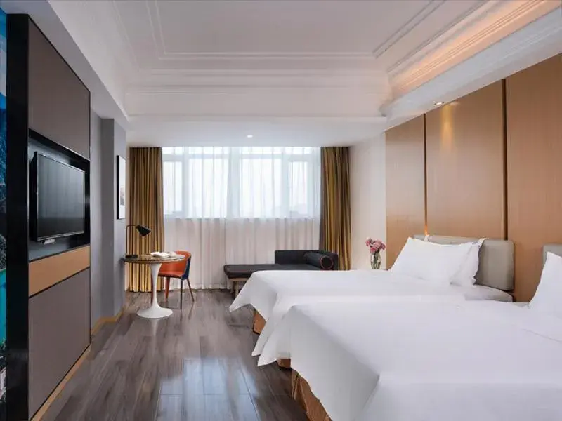 Bed in Vienna International Hotel Zhongshan Shiqi Kanghua Road Bed in Vienna International Hotel Zhongshan Shiqi Kanghua Road