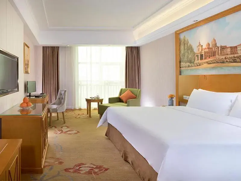 Bed in Vienna Hotel HaiNan Oriental Avenue Bed in Vienna Hotel HaiNan Oriental Avenue