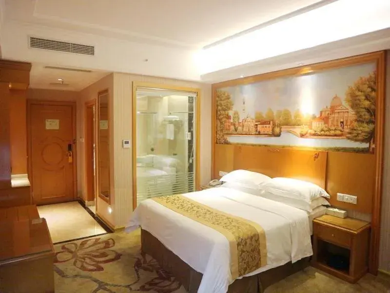 Bed in Vienna Hotel HaiNan Oriental Avenue Bed in Vienna Hotel HaiNan Oriental Avenue