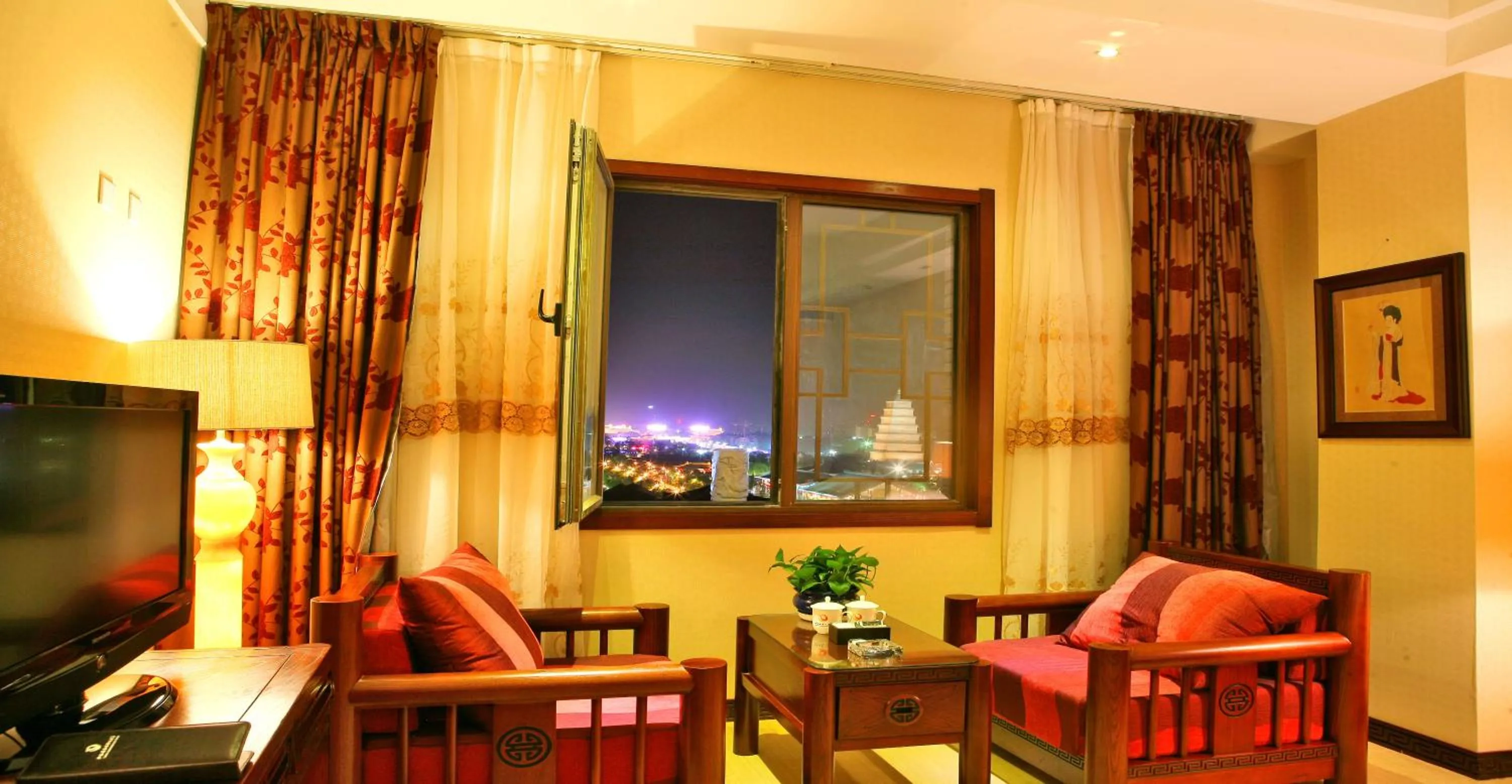 Communal lounge/ TV room in Vienna International Hotel Xi'an Dayan Tower