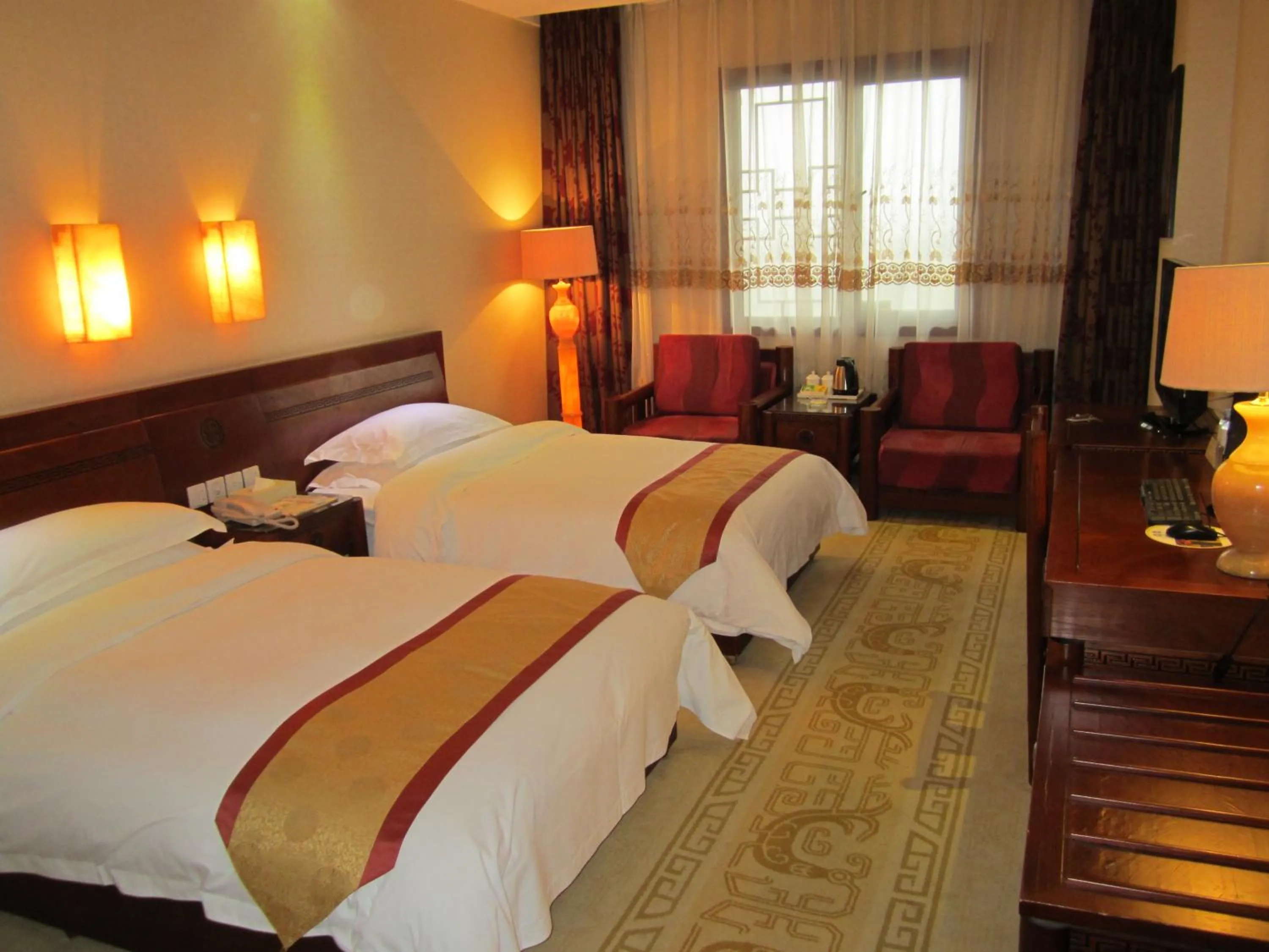 Bed in Vienna International Hotel Xi'an Dayan Tower
