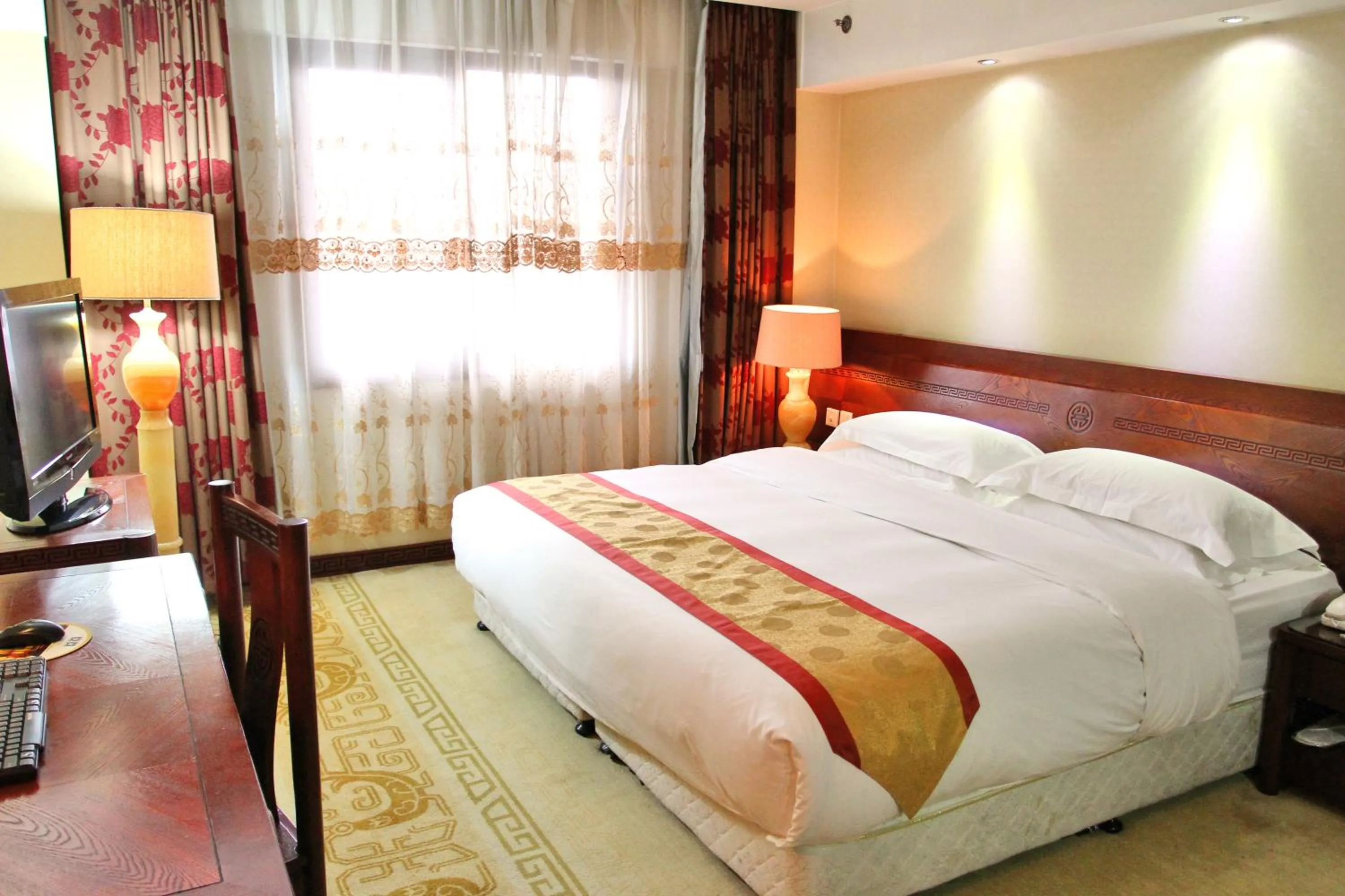 Bed in Vienna International Hotel Xi'an Dayan Tower