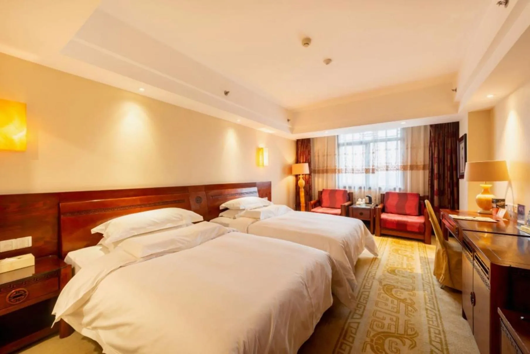 Bed in Vienna International Hotel Xi'an Dayan Tower