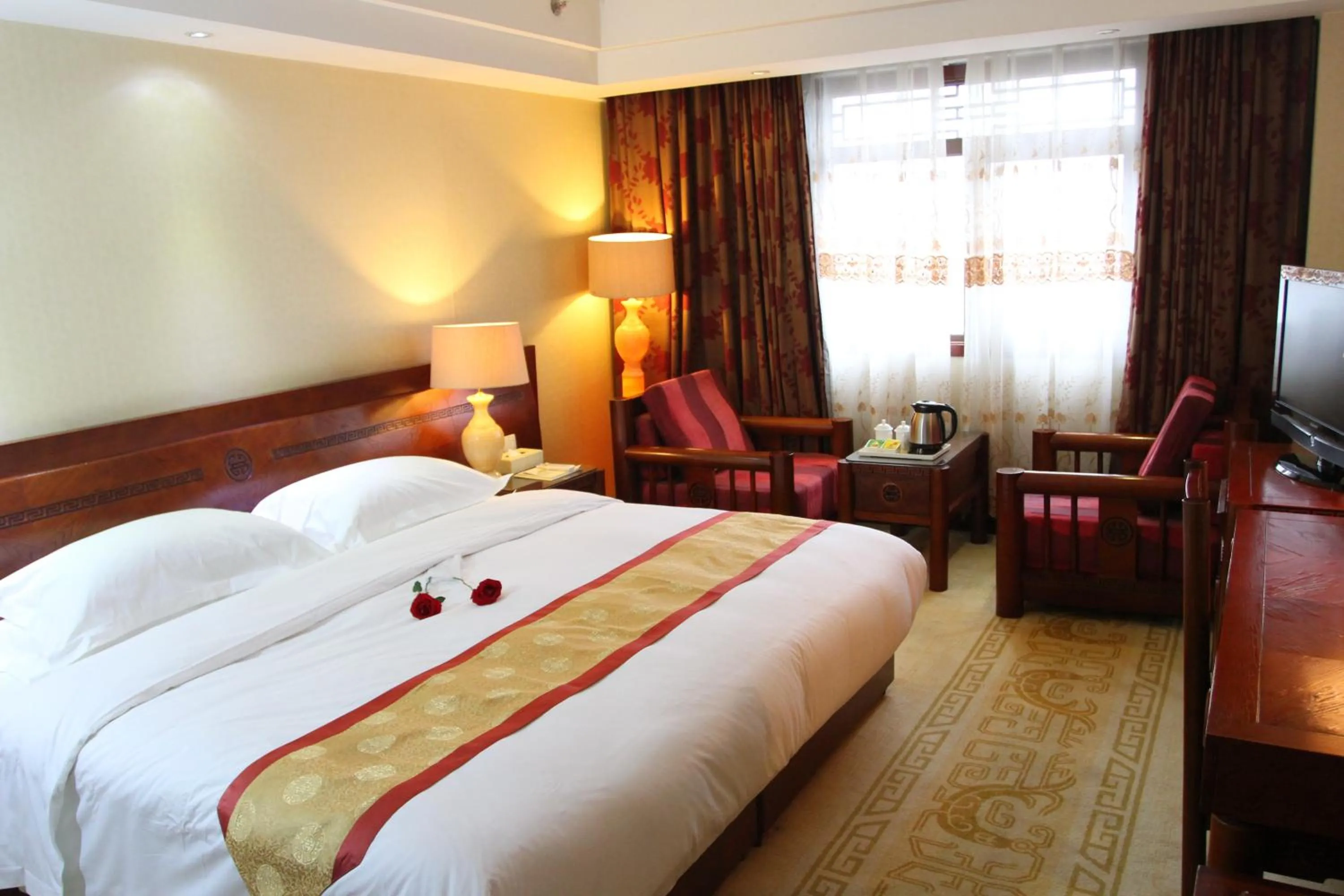 Bed in Vienna International Hotel Xi'an Dayan Tower