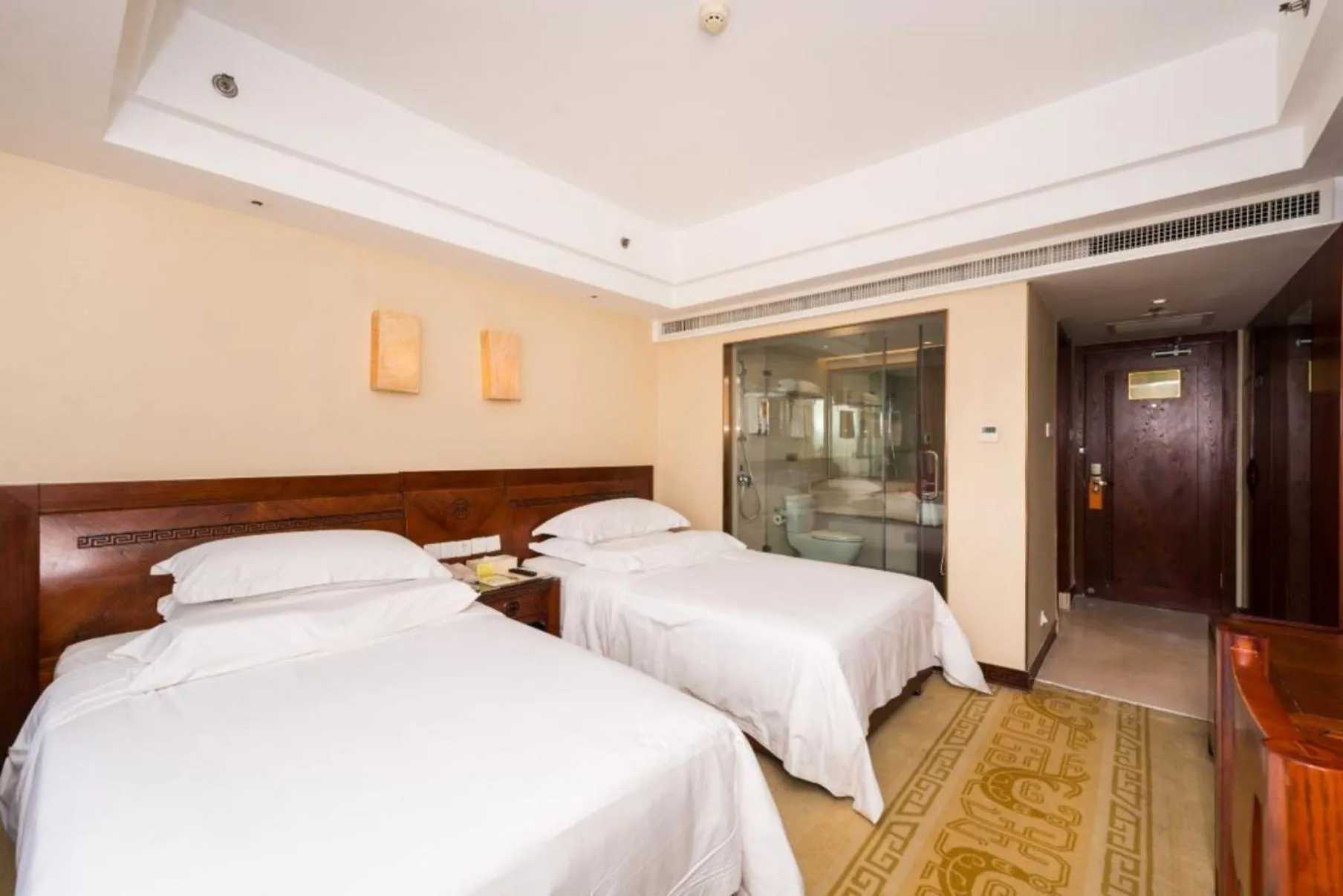 Bed in Vienna International Hotel Xi'an Dayan Tower