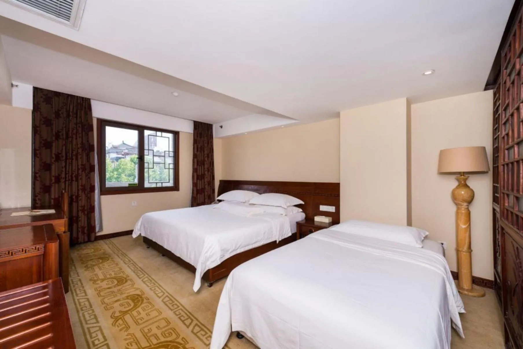 Bed in Vienna International Hotel Xi'an Dayan Tower