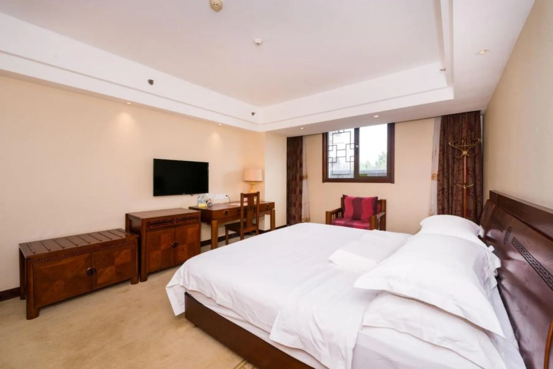 Bed in Vienna International Hotel Xi'an Dayan Tower