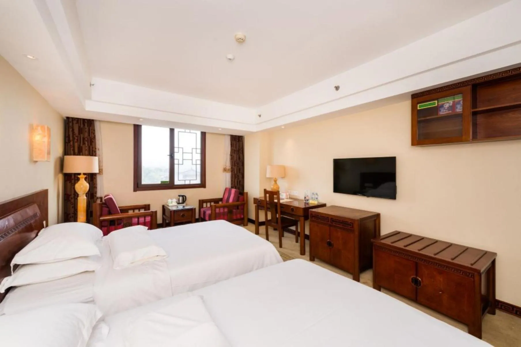 Bed in Vienna International Hotel Xi'an Dayan Tower