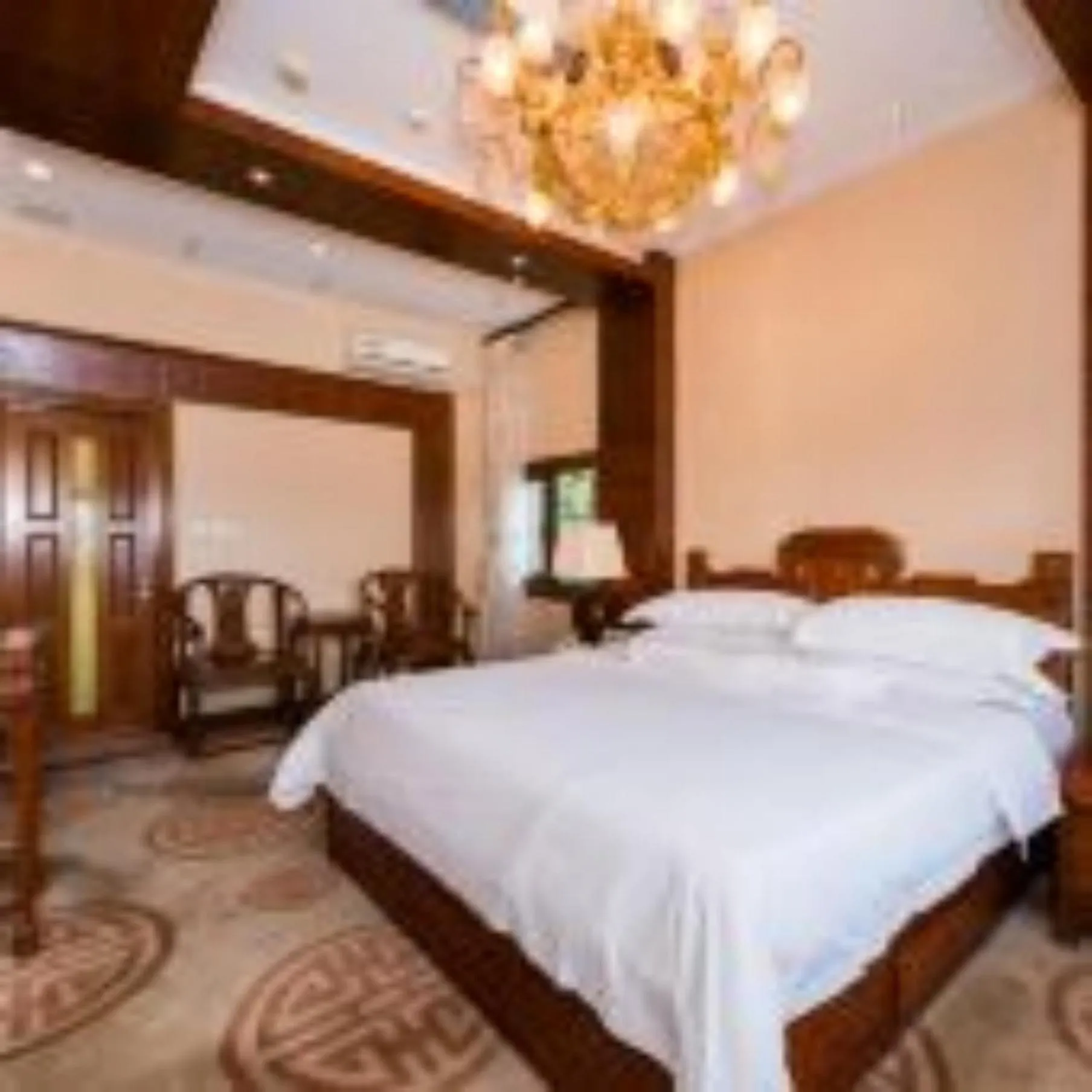 Bed in Vienna International Hotel Xi'an Dayan Tower