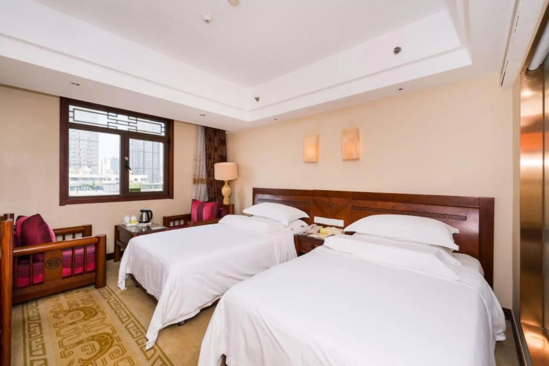 Bed in Vienna International Hotel Xi'an Dayan Tower