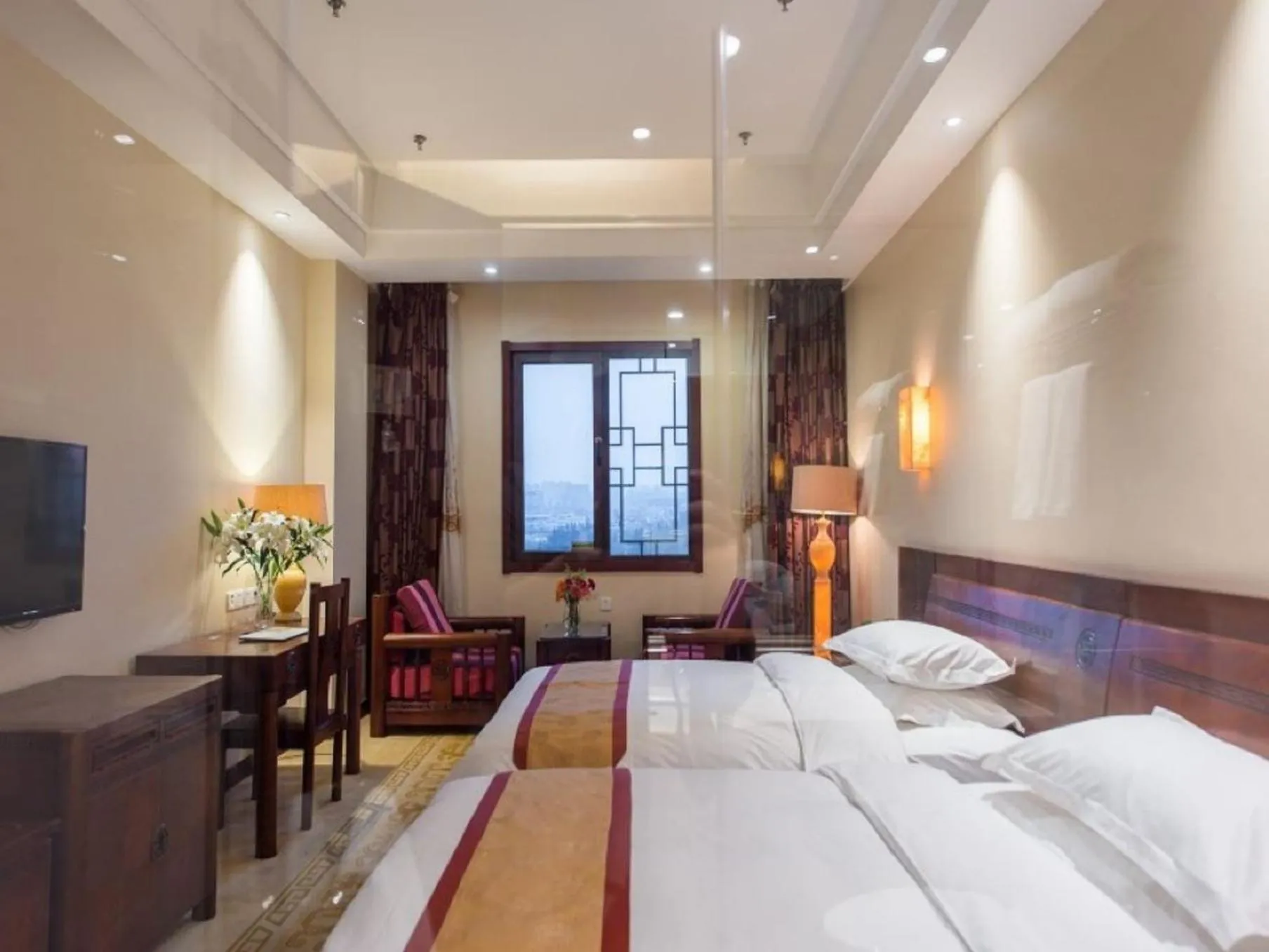 Bed in Vienna International Hotel Xi'an Dayan Tower