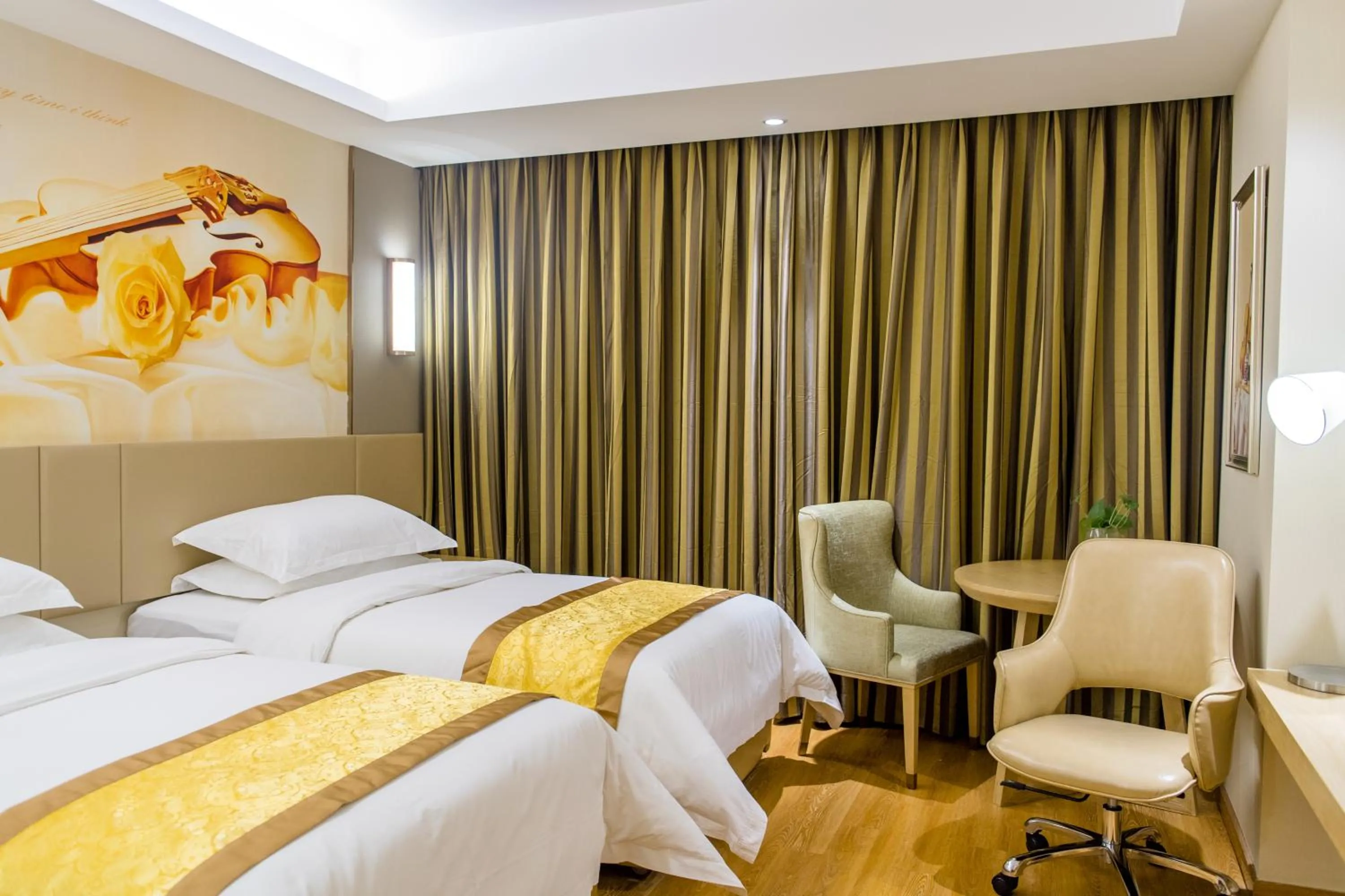 Bed in Vienna International Hotel Xi'an Dayan Tower