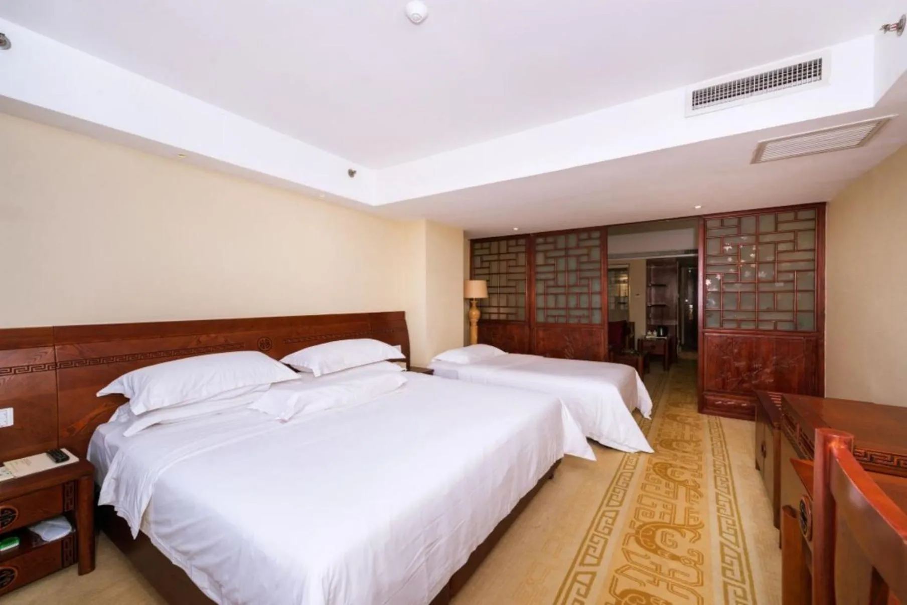 Bed in Vienna International Hotel Xi'an Dayan Tower