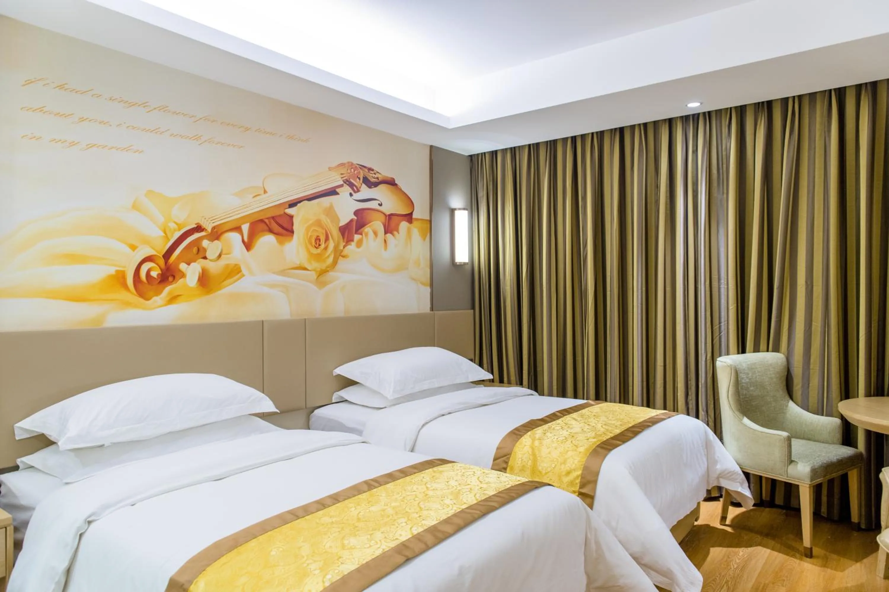 Bed in Vienna International Hotel Xi'an Dayan Tower