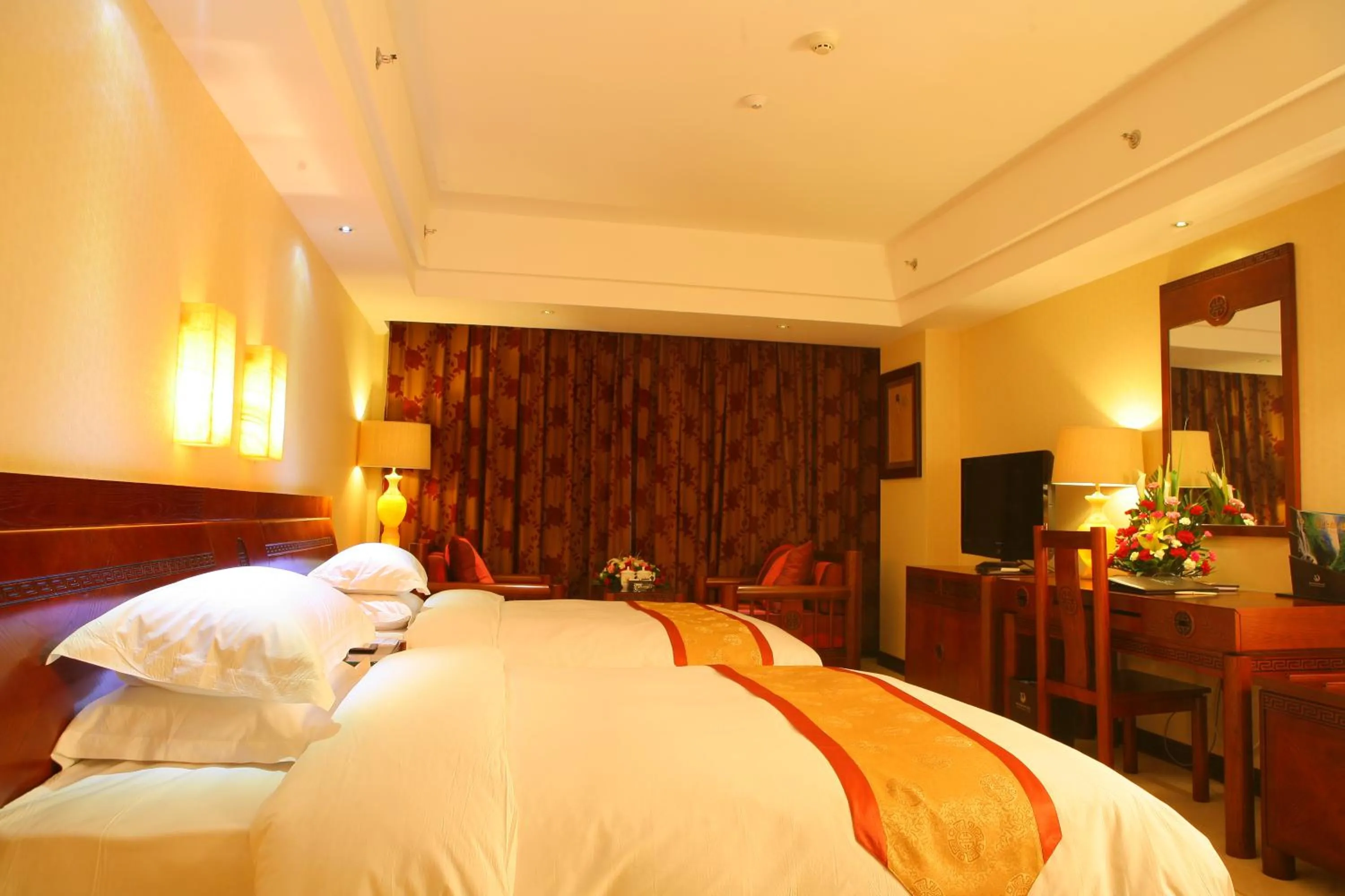 Bed in Vienna International Hotel Xi'an Dayan Tower