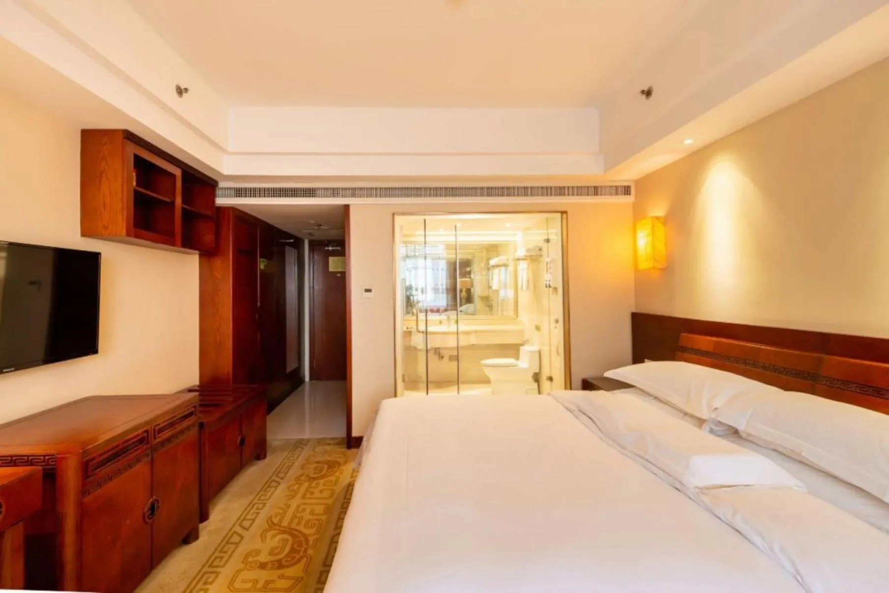 Bed in Vienna International Hotel Xi'an Dayan Tower