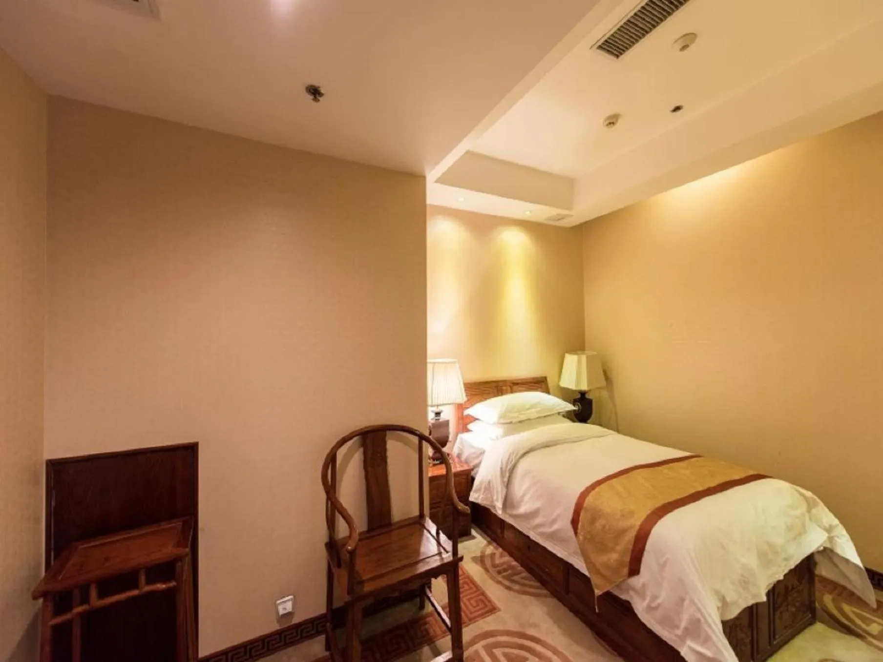 Bed in Vienna International Hotel Xi'an Dayan Tower