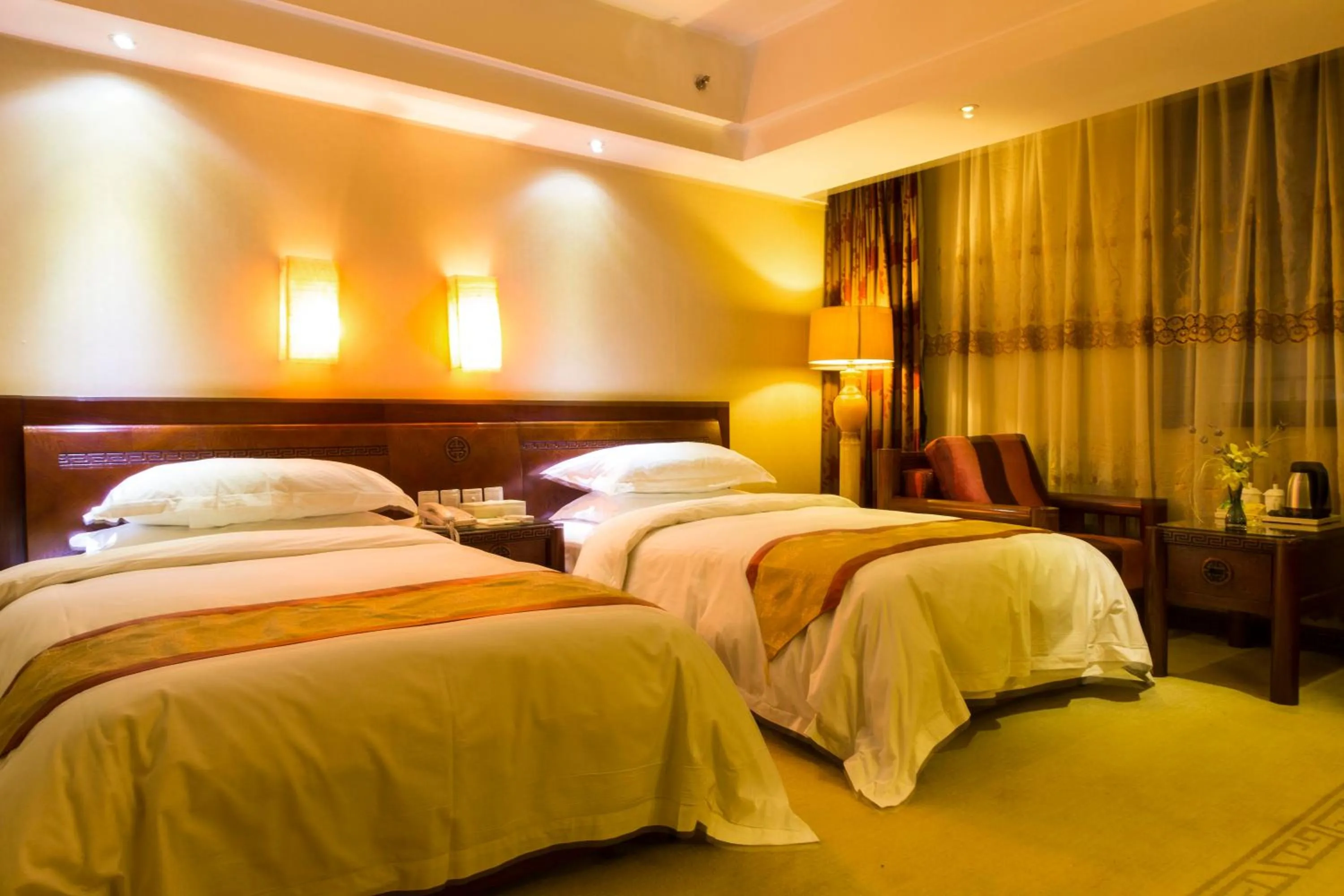 Bed in Vienna International Hotel Xi'an Dayan Tower