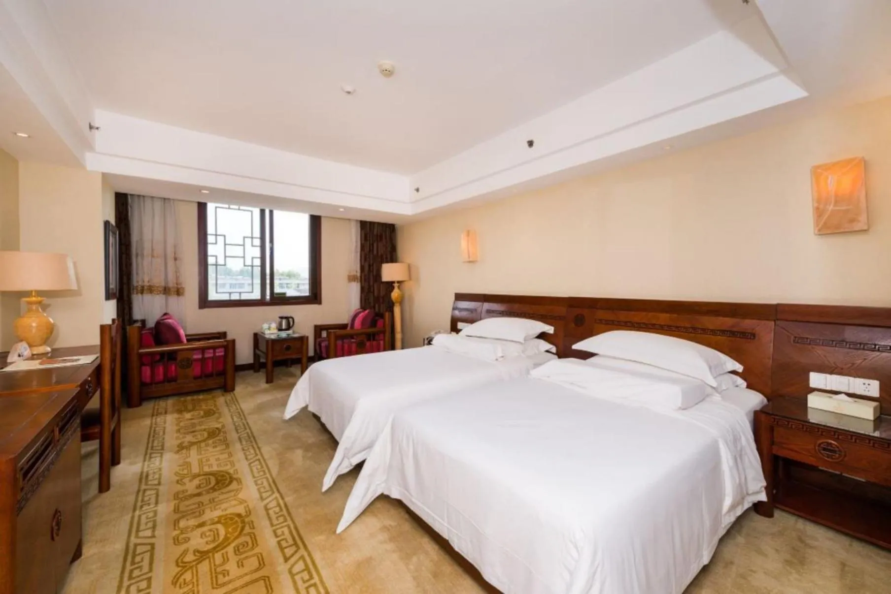 Bed in Vienna International Hotel Xi'an Dayan Tower